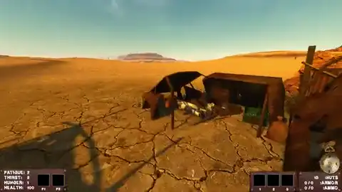 Driving a desert road with the compass and a landmark wreck